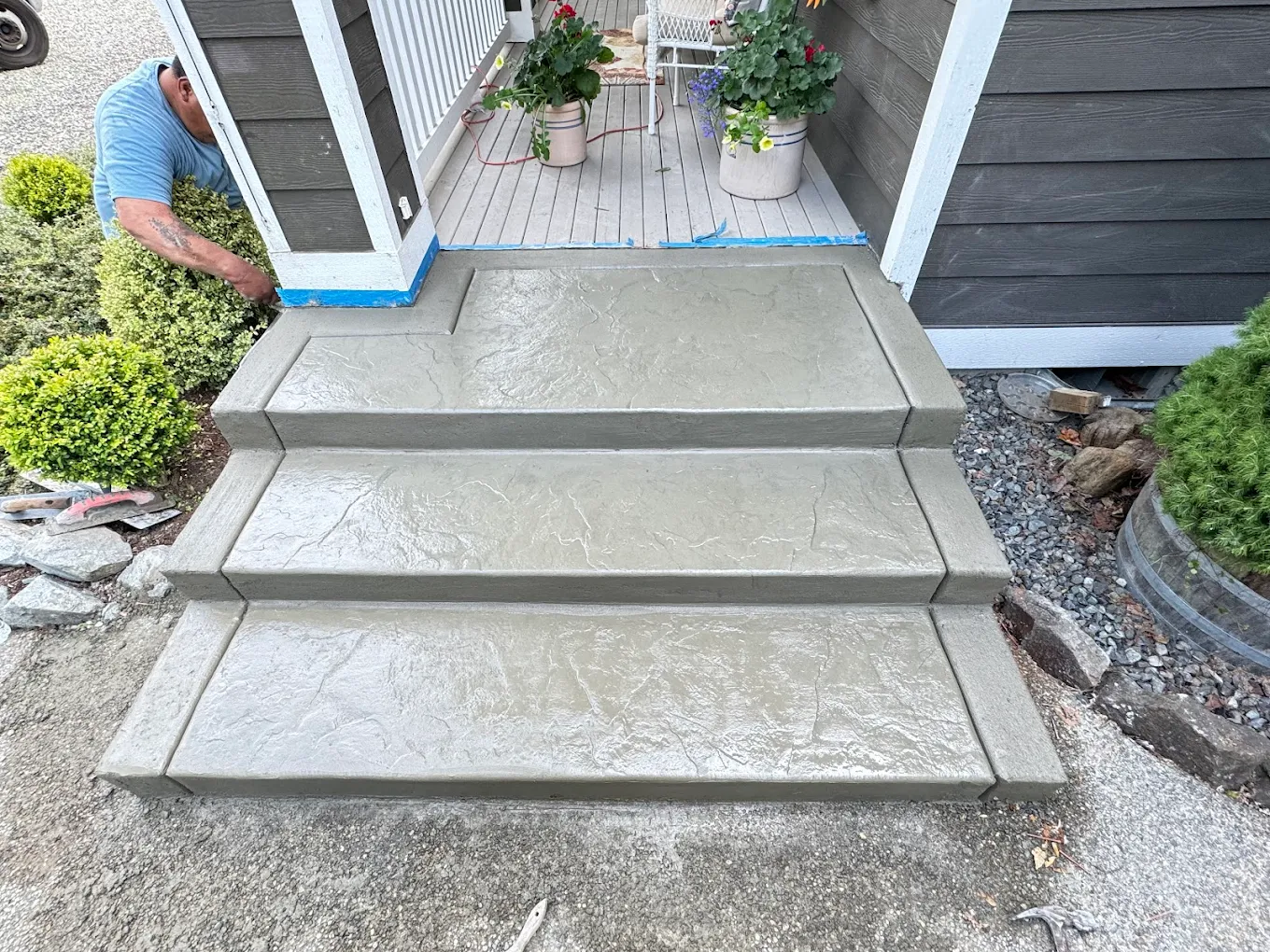 A finished concrete and landscaping project by Four Sons